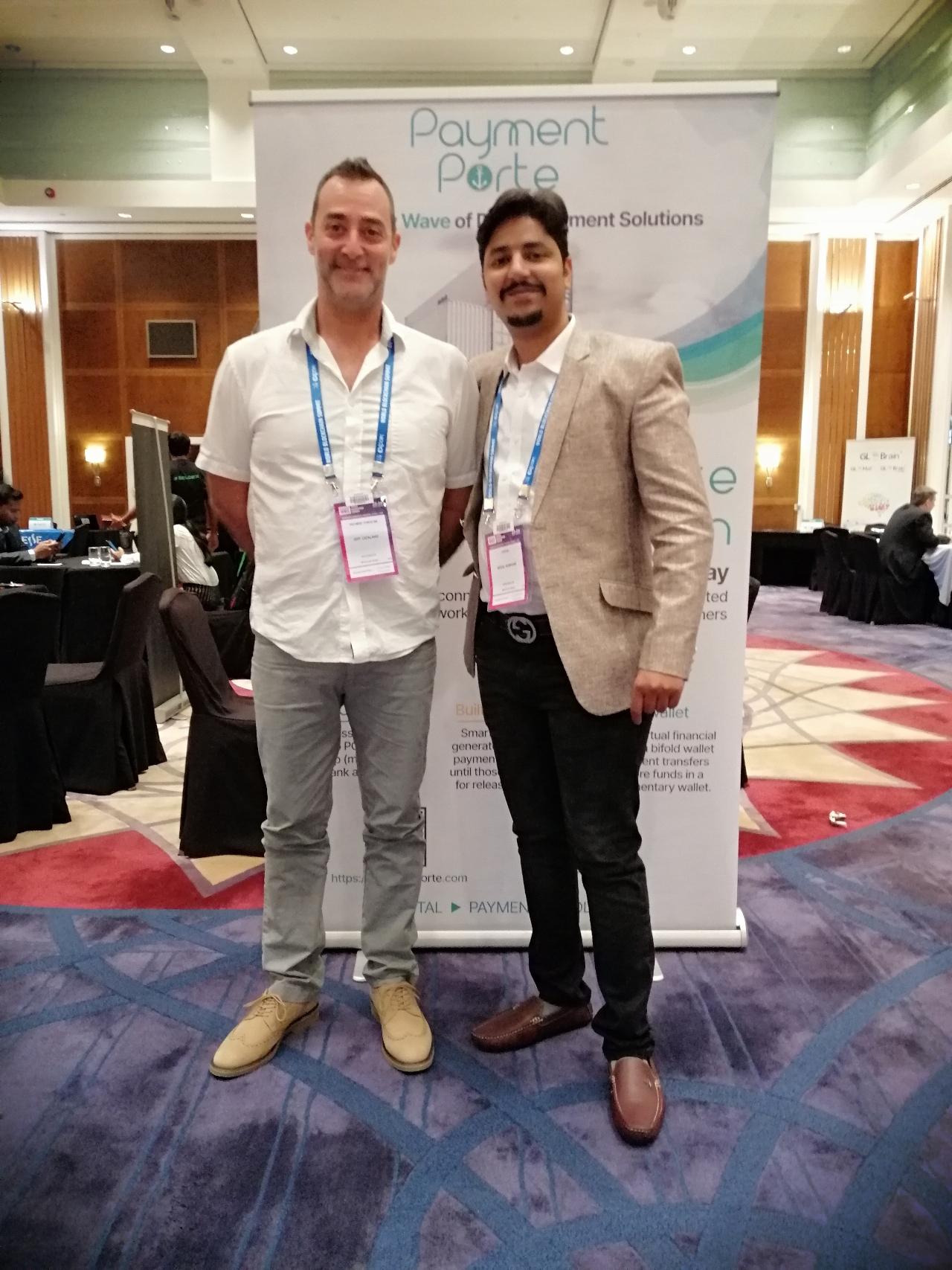 Muhammad Afzal Subhani with a business counterpart at a professional event